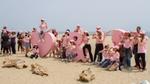 Members of the Love Beauty and Planet team dressed in pink.