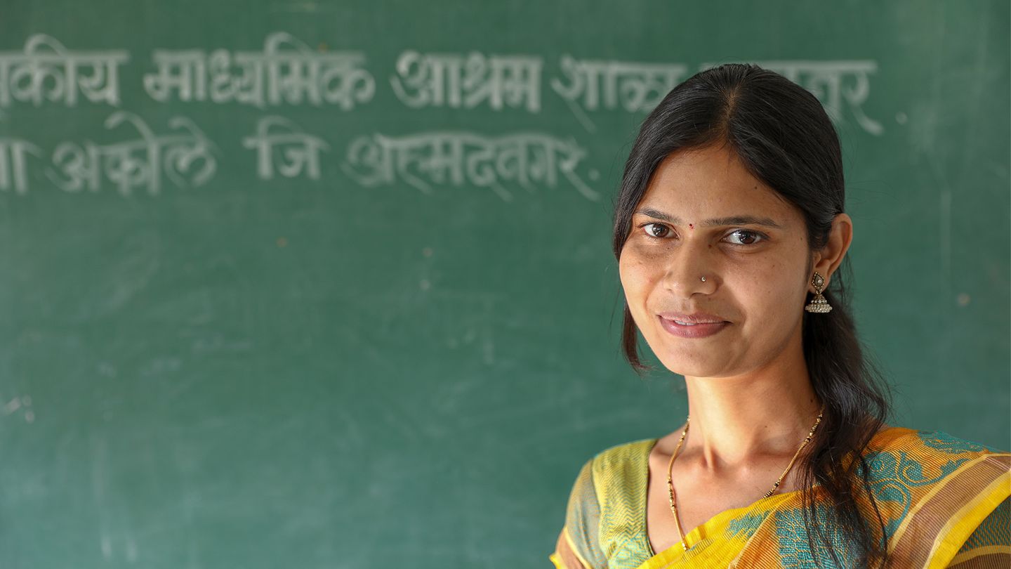 A woman smiling at the camera