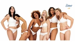 A line of six women in white underwear laughing and smiling at the camera