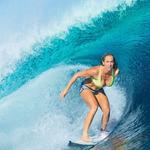 Pro-surfer Bethany Hamilton riding a wave