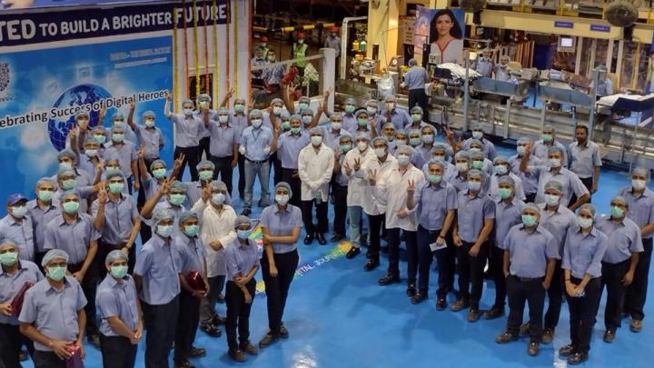 a group of people getting a demonstration