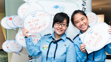 Two young girls in Girl Guide uniforms at a Free Being Me workshop