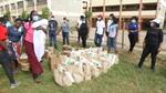 Mukuru residents queuing up to receive food aid