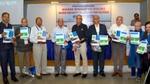 A group photo taken at an event to launch a water study done for Gujarat