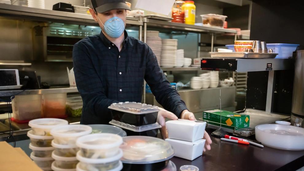 Man worker organizing a kitchen