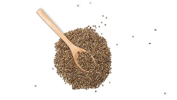 Small nuts and a wooden spoon