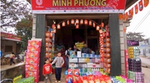 a market selling Unilever products in Vietnam. Products from OMO and many other brands are on display.