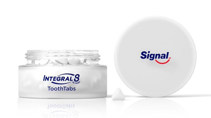 Signal toothpaste tablets in jar. 