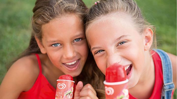 two girls holding ice-cream