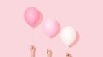 Three pink balloons lined up