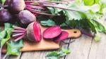 Image of beetroot on table and chopping board