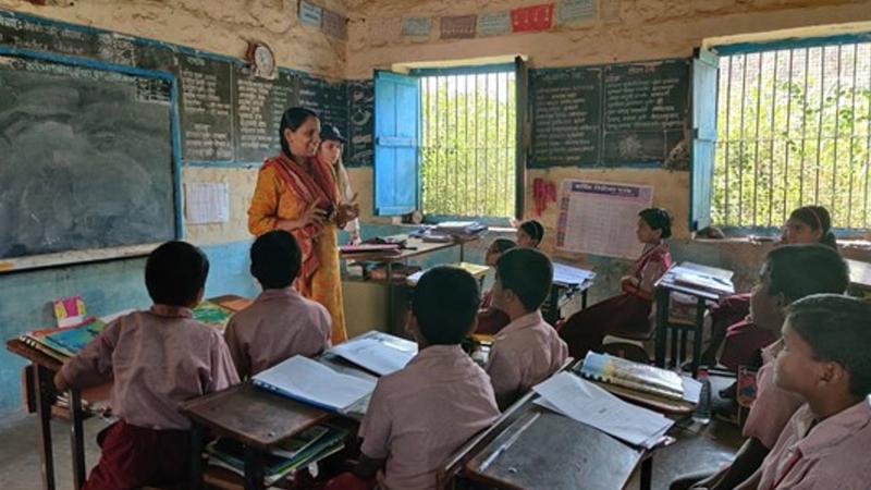 Hul Waste No More school curriculum on waste management being taught by a schoolteacher to students in a classroom. 