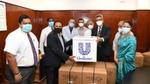 Unilever Sri Lanka officials handing over 32 oxygen concentrators worth Rs. 10 million to Ministry of Health officials
