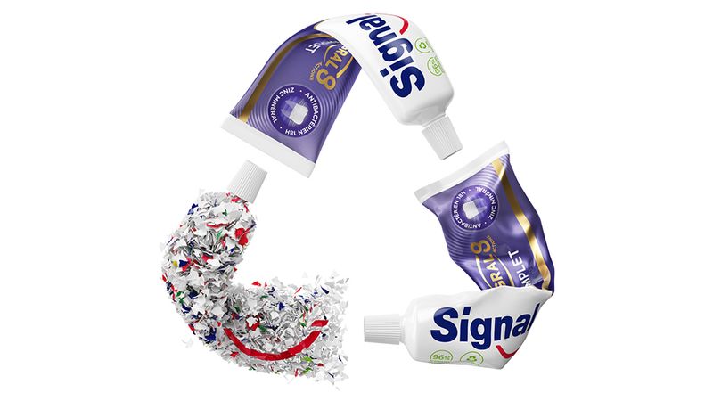 Recycling symbol with signal toothpaste tubs