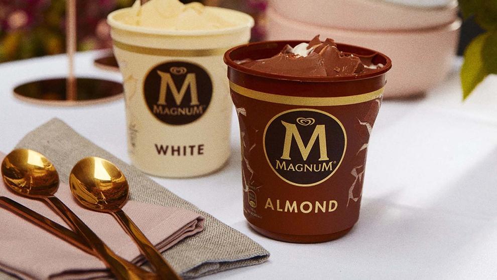 Magnum's White and Almond tubs displayed on a table