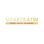 Vitakeratin is written in golden yellow letters against a pink background. Smaller Expert Salon Treatment is under it in opposite hues.