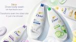 Advertising image showing four bottles in the new Dove Body Wash range.