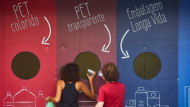 Man and woman recycling Unilever products at the local recycling plant in Brazil