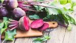 An image of a beet on a chopping board