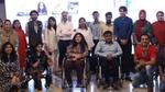 A large group of trainees and employees, some with disabilities