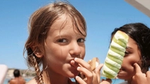 A girl eating a twister ice cream