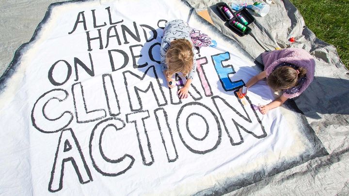 Painting a climate action banner