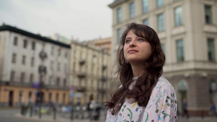 Martyna Kaczmarek looking thoughtful on St Saviour’s Square, Poland