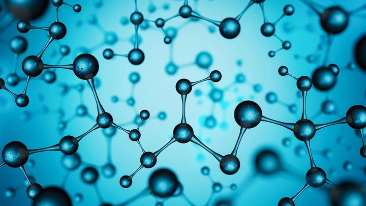 many connected atoms on a blue background