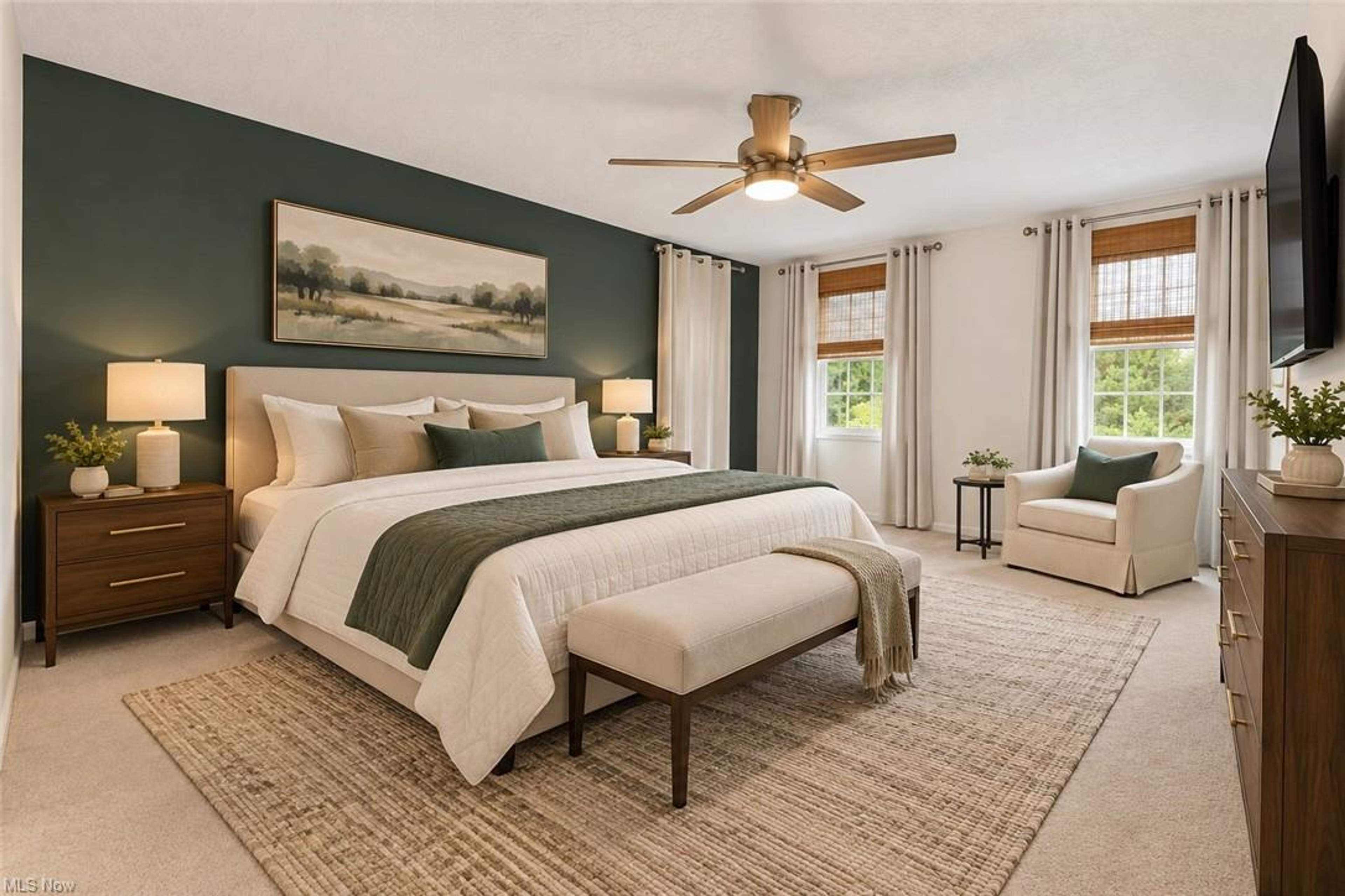 Bedroom with ceiling fan and new carpet