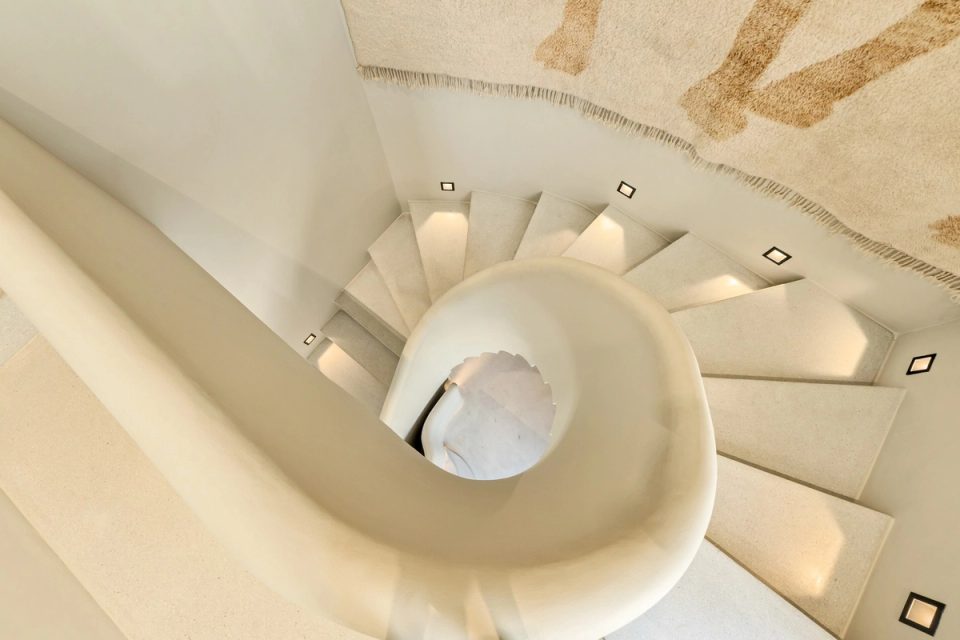 Sculptural spiral staircase at The White Camel