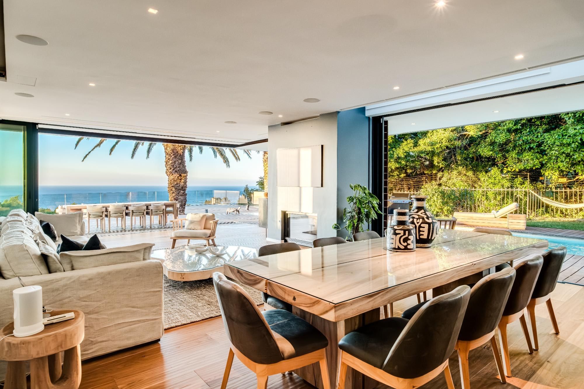 Dining area opening to the pool at Lion's Lookout
