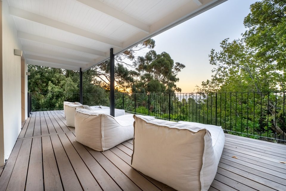Covered upper terrace overlooking the leafy Camps Bay setting