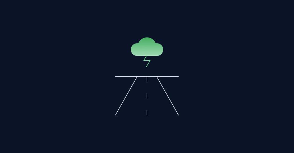 A road towards a dark cloud with lightning