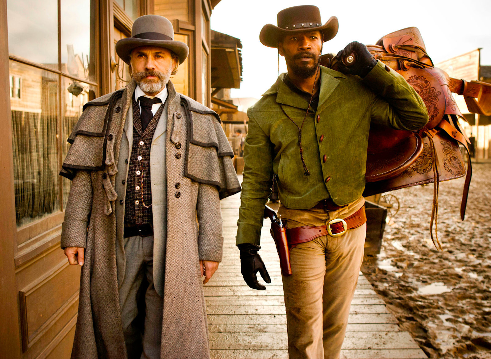 Dr Schultz and Django dressed in stylish Western-style clothing evoking a unique style in a film about Slavery.