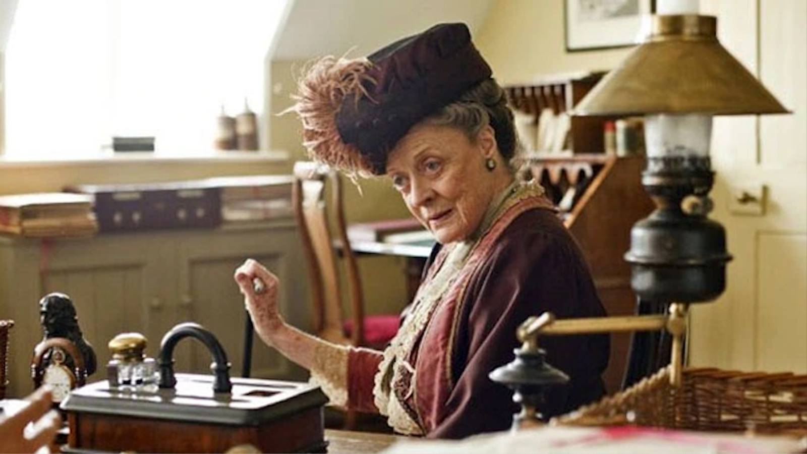 Maggie Smith as Violet Crawley, the Dowager Countess of Grantham in Downton Abbey, as she stares down a likely opponent.