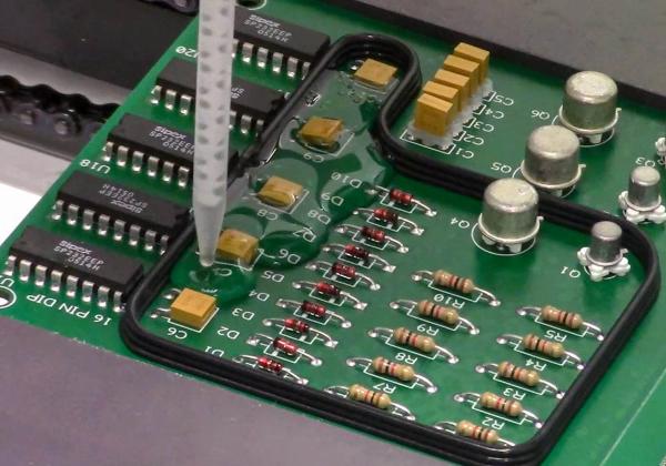 Resin dam on PCB