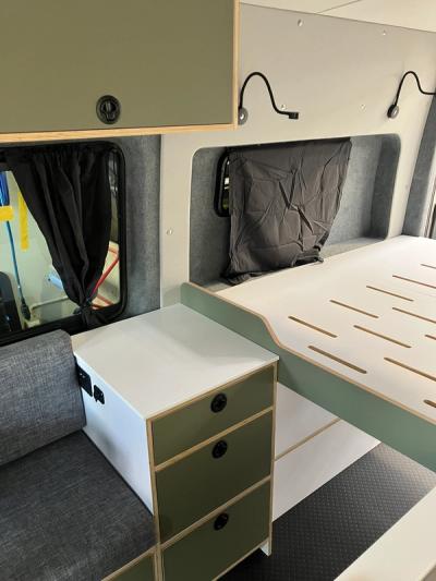 Merceded Sprinter couch, drawers, locker, and bed