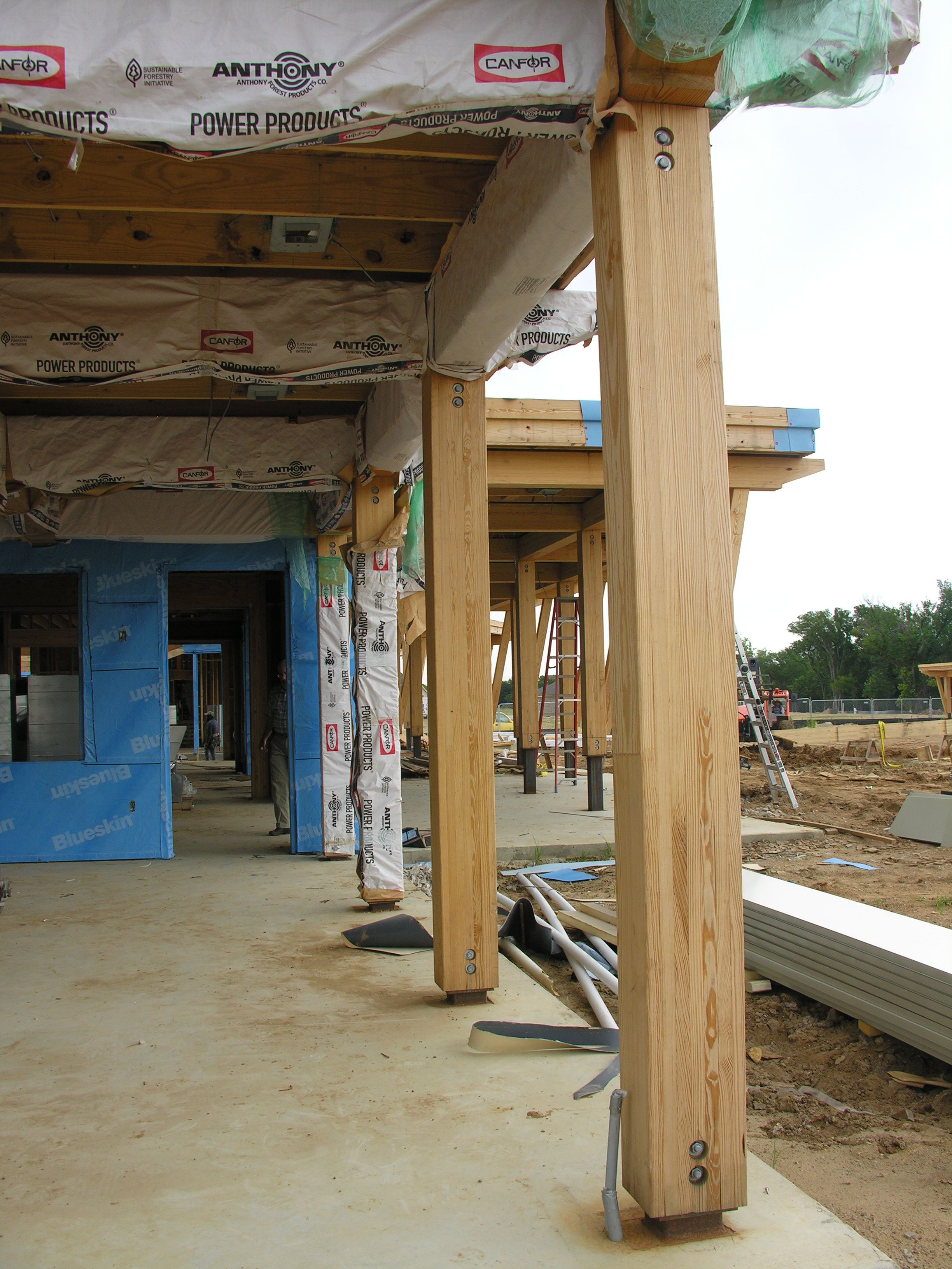 a building under construction with anthony power products covering the ceiling