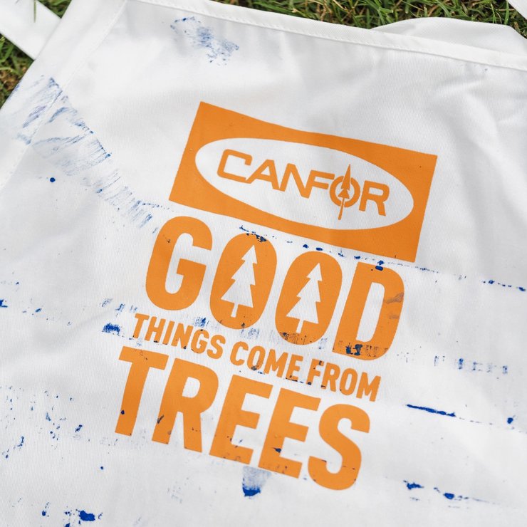 a white shirt that says good things come from trees