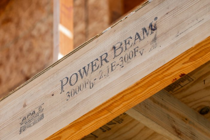 a wooden beam that says power beam on it.