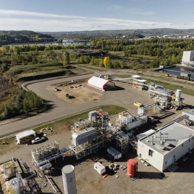 an aerial view of a large industrial area with a lot of buildings and machinery .