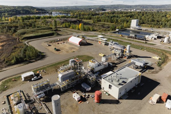 an aerial view of a large industrial area with a lot of buildings and machinery .