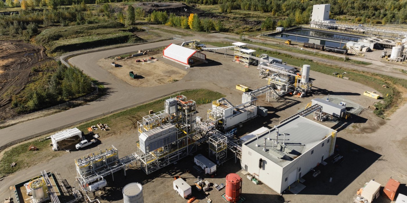 an aerial view of a large industrial area with a lot of buildings and machinery .
