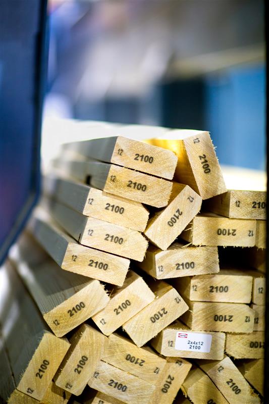 a stack of wooden boards with the number 2100 on them