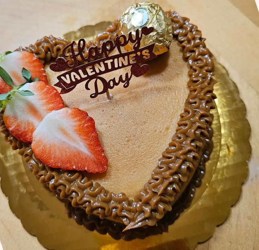Heart-shaped custom Valentine's cake by Ashley's Sweets