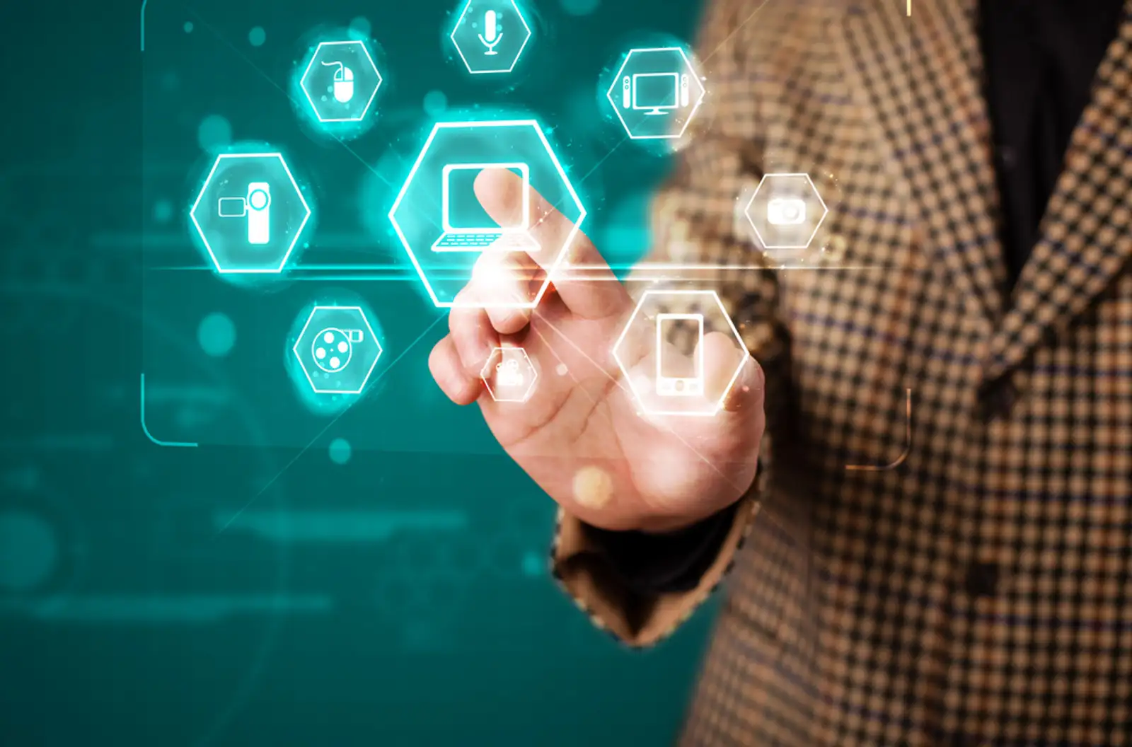 Young businessman pressing virtual media type of buttons.jpeg