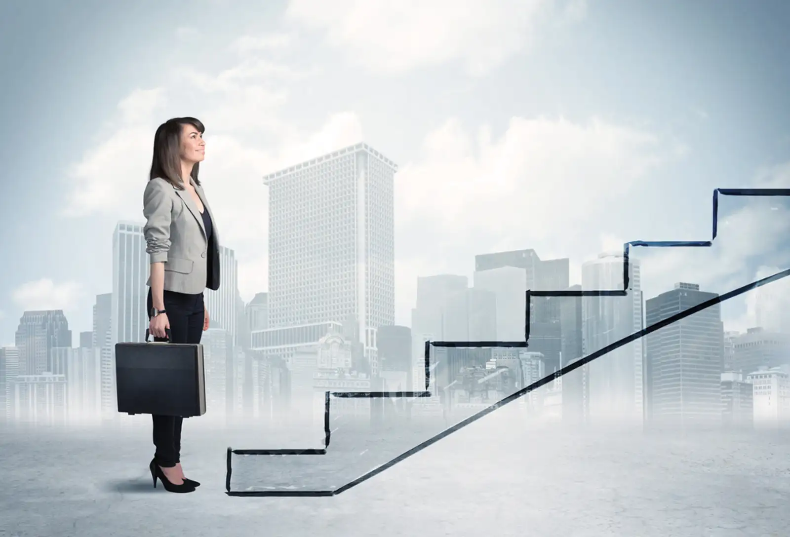 Business person in front of a staircase%2c city on the background.jpeg