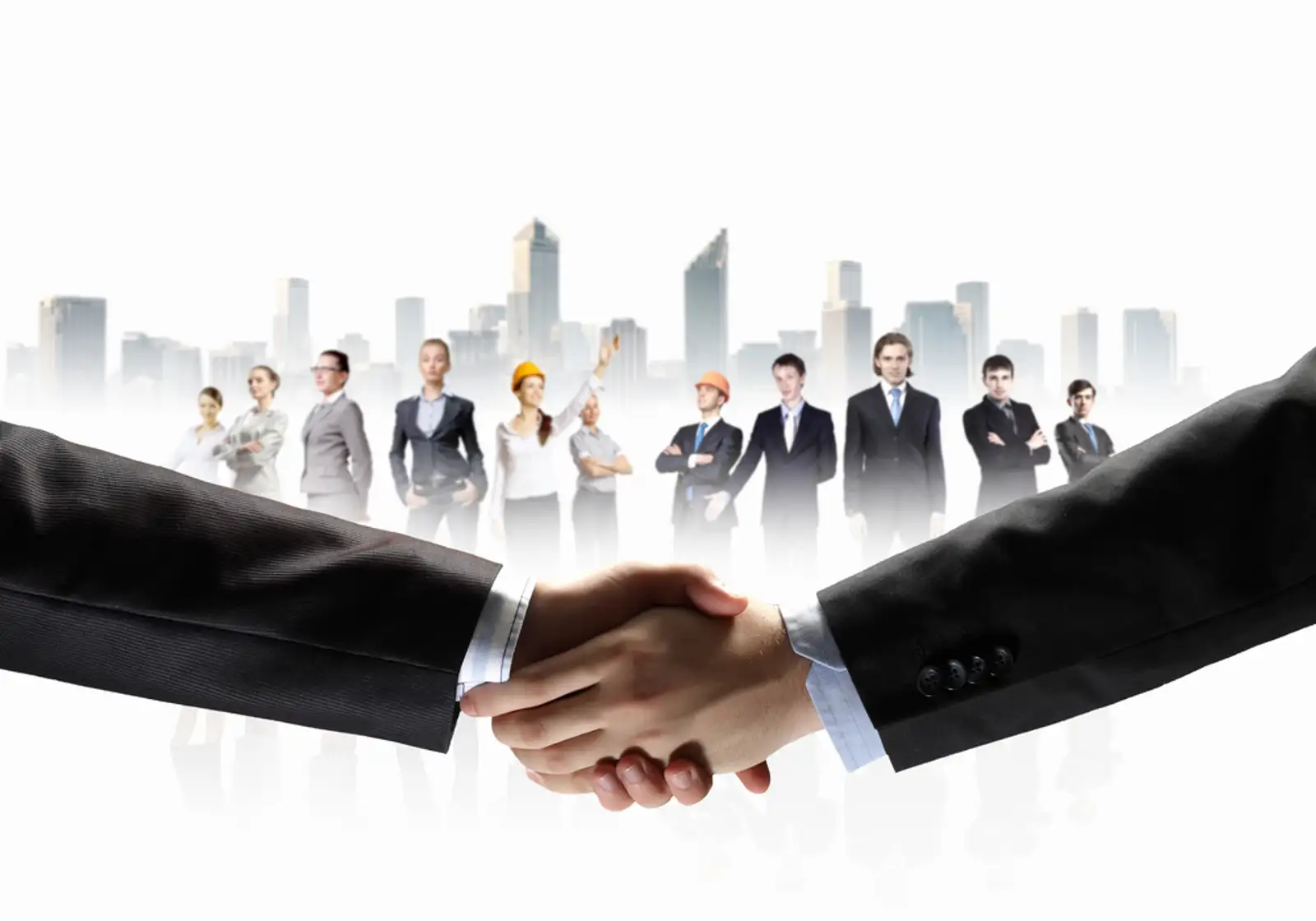 business handshake against white background and standing businesspeople.jpeg