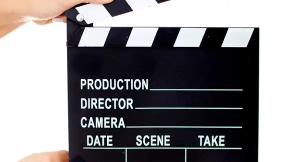 Movie clapperboard - isolated over a white background.jpeg