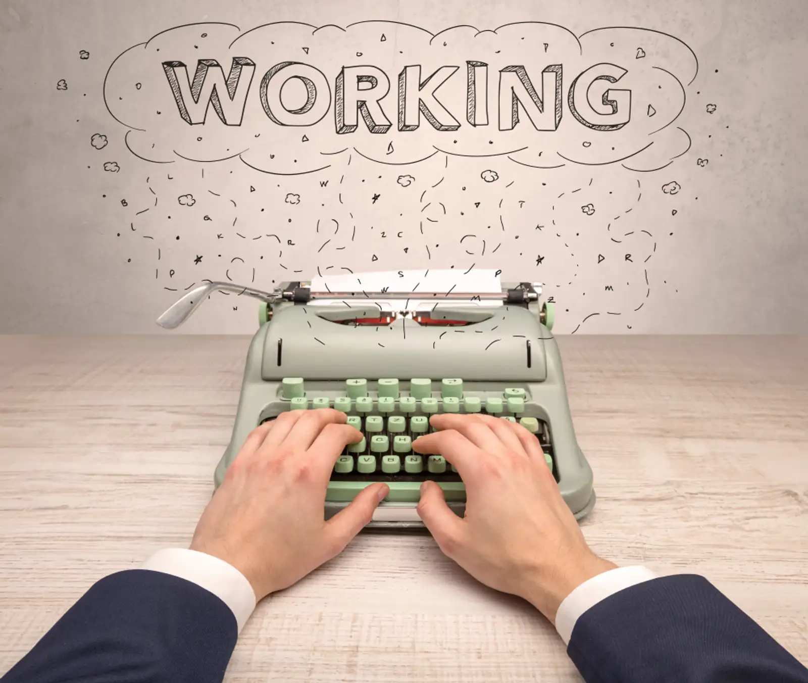 First person perspective hand writing on typewriter with cloud message concept.jpeg